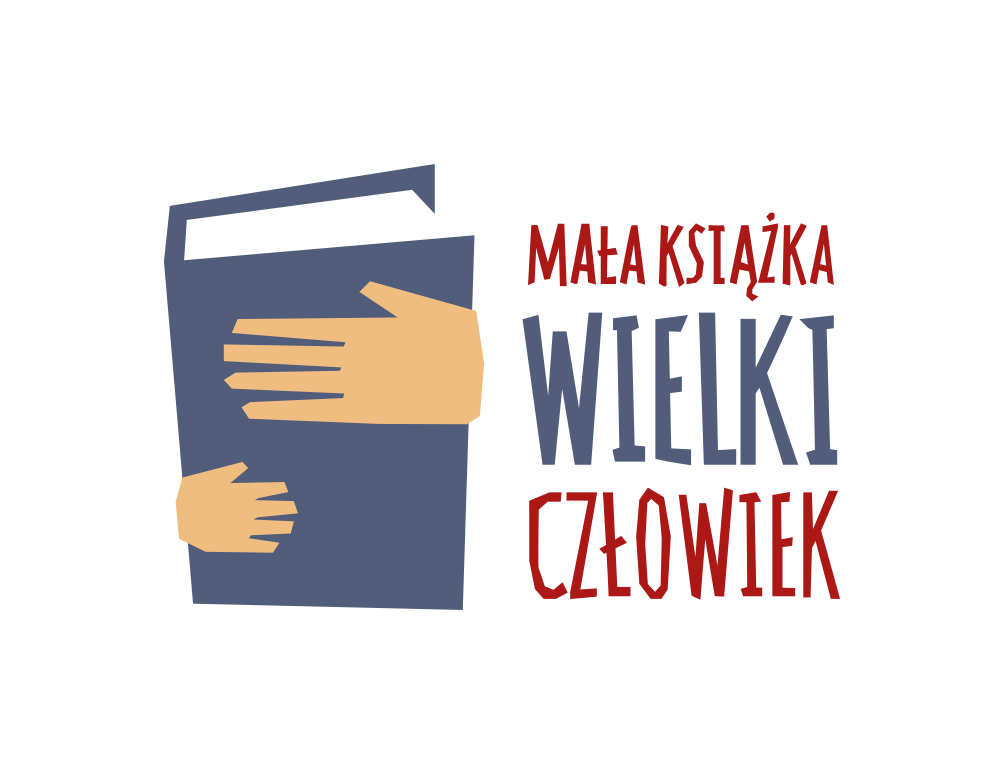 książka ściskana dłoniami